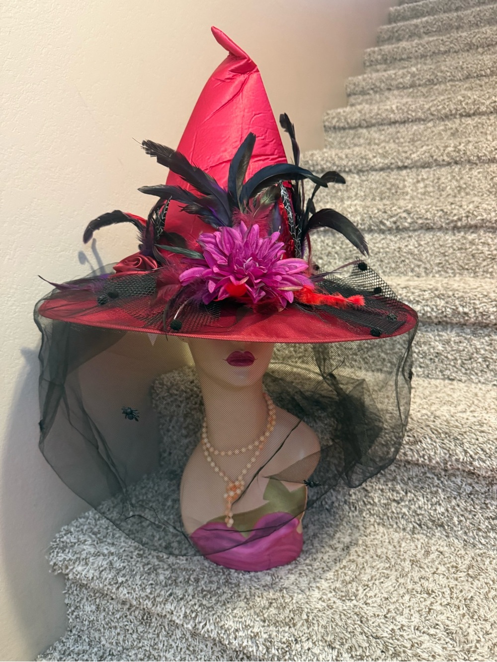 Red Decorative Witch Hat with Black Veil and Floral Accent